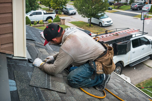 Professional Emergency Roof Repair technician working in Milton, VT